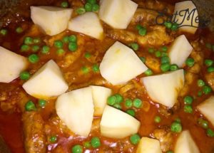 Chicken Necks With Potatoes And Peas Curry