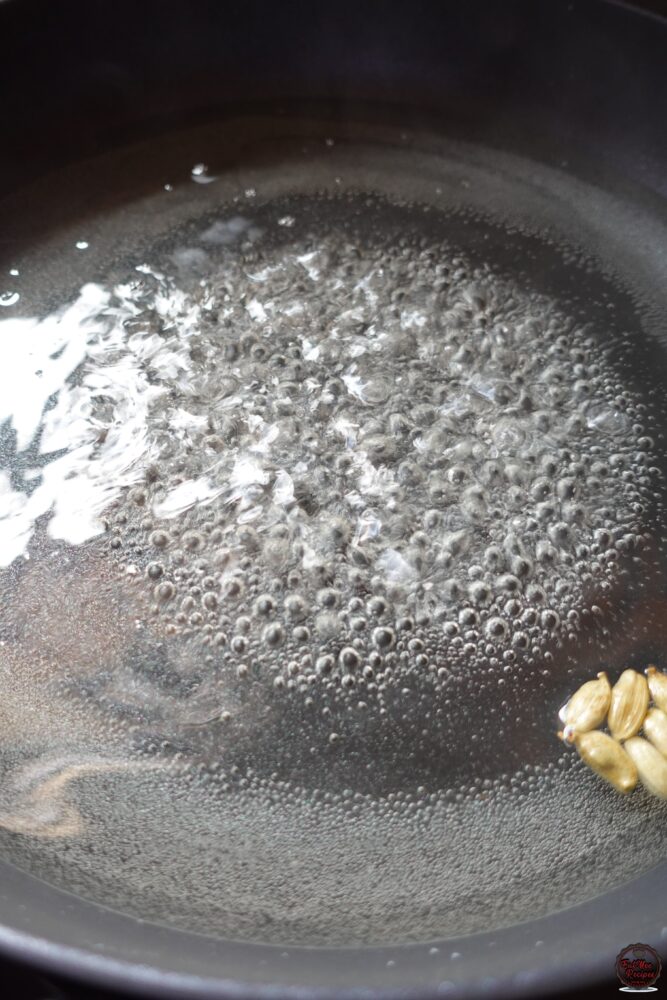 Once it reaches a boil, turn down the heat to low & allow the syrup to simmer until slightly thickened.