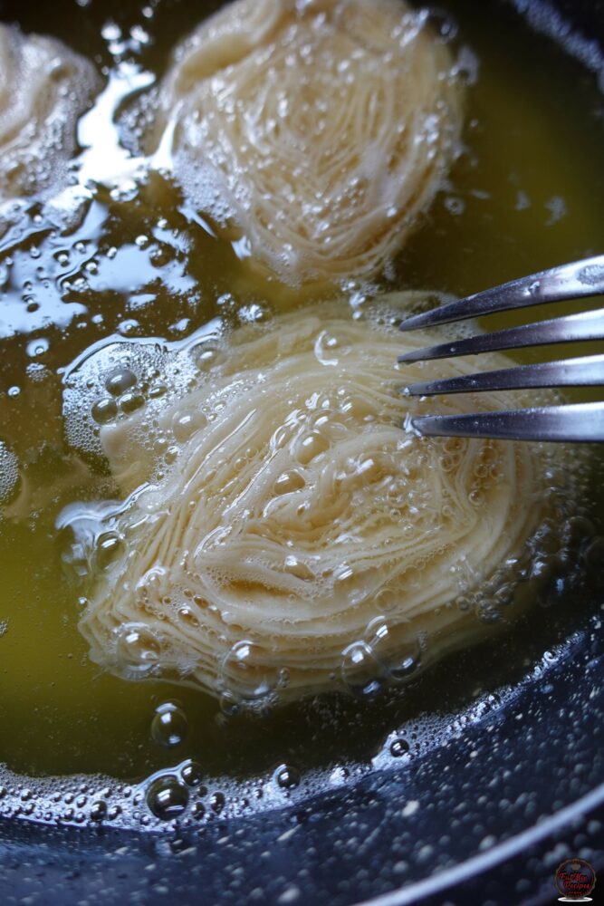 Use two forks to gently open up the layers as they are frying.