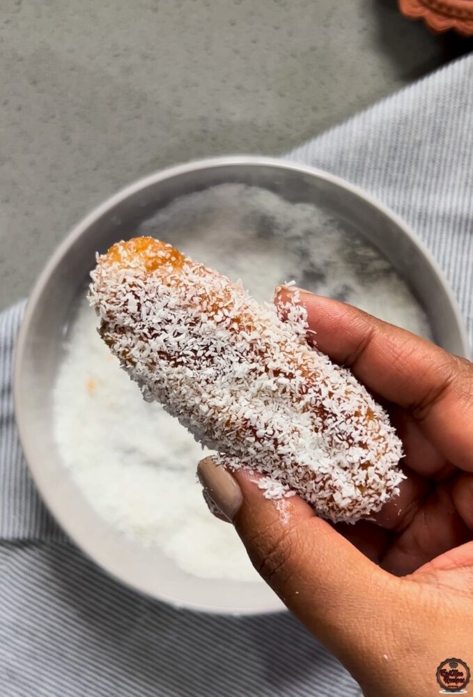 Once they are done soaking, roll them into desiccated coconut. This step may be omitted if you're not a coconut lover.