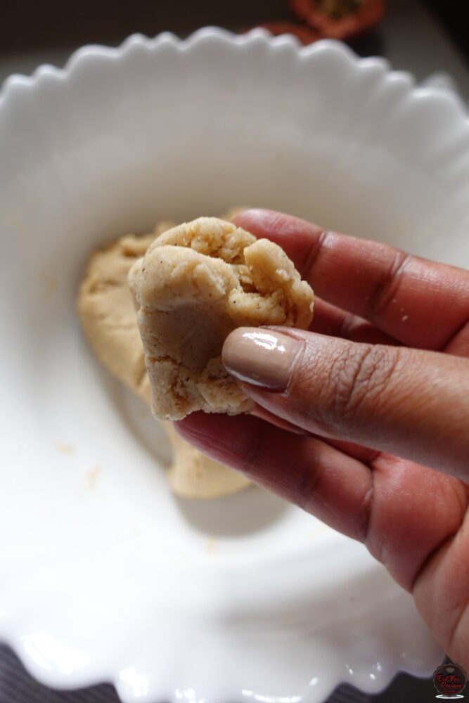 Pinch off small pieces of dough at a time.