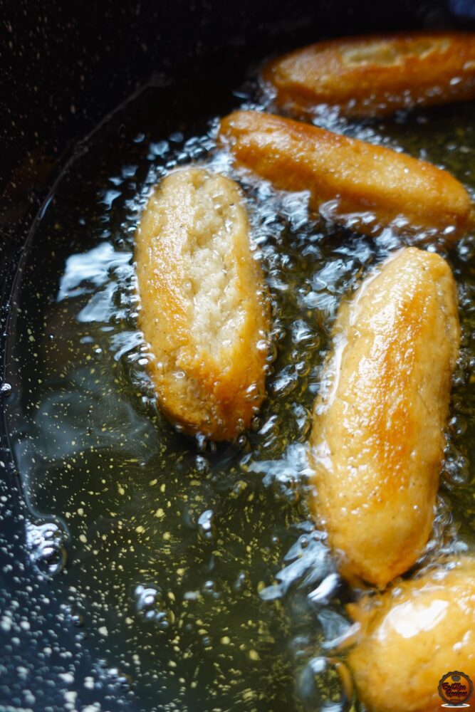 Keep rotating them & fry until they are golden.