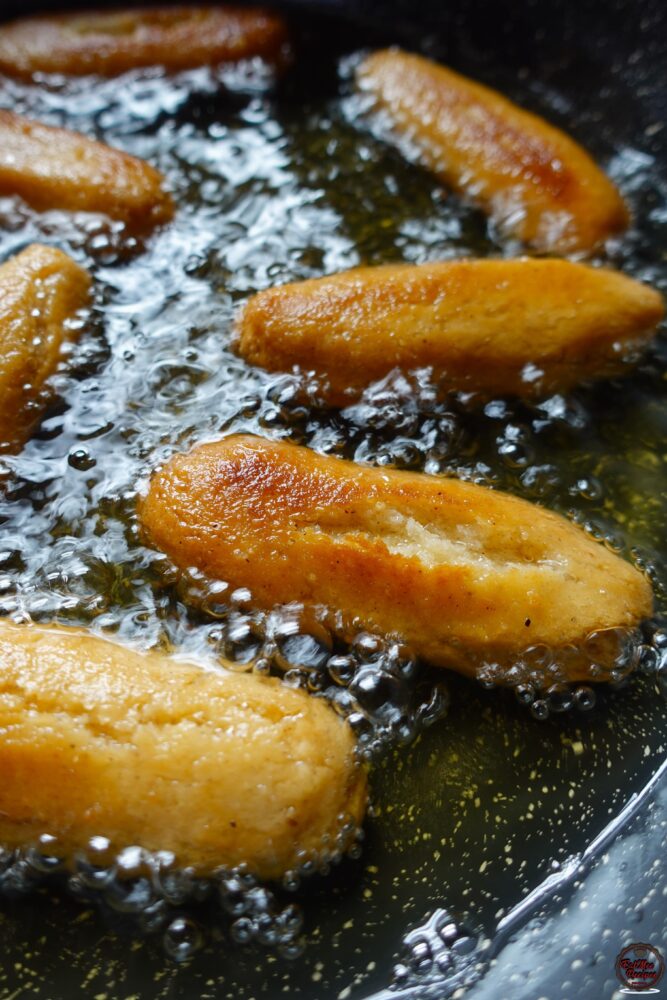 Keep rotating them & fry until they are golden.