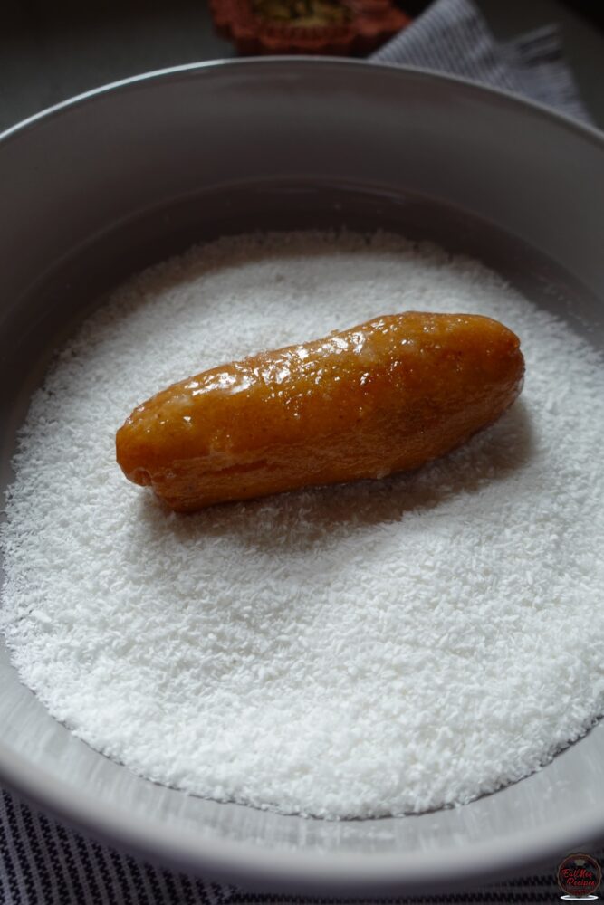 Once they are done soaking, roll them into desiccated coconut. This step may be omitted if you're not a coconut lover.