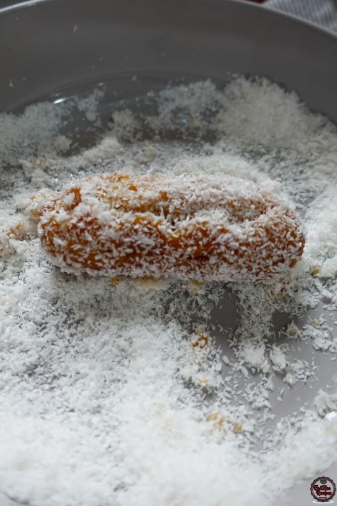 Once they are done soaking, roll them into desiccated coconut. This step may be omitted if you're not a coconut lover.