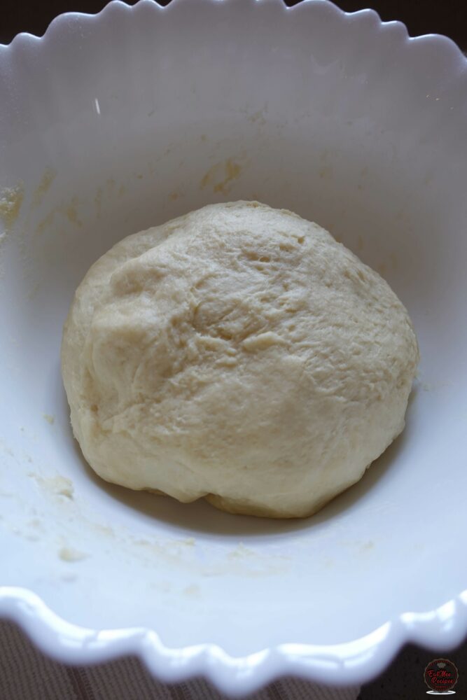 At first the dough should be tacky, knead it for 1-2 minutes until smooth. 