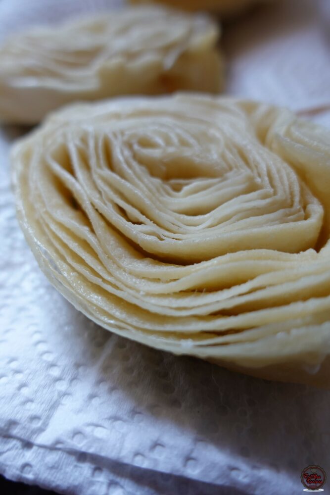 The puri's should fry for about 4 minutes on each side, try not to make them brown as they should still be white in colour. Once fried, drain them on paper towels.