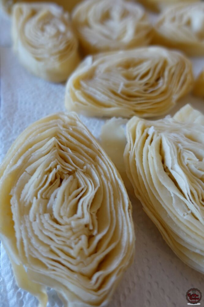 Next you want to place them back onto paper towels & allow them to drain out the oil for at least a day. Keep changing the paper towels as these Banana Puri's absorb a lot of oil.